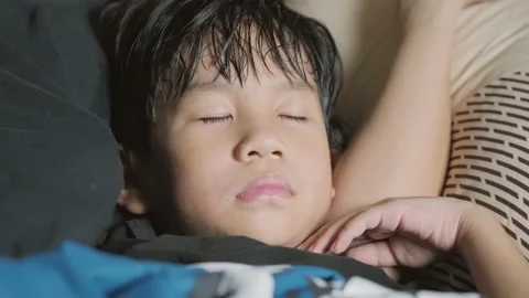 Sleeping tired Asian boy with excessive sweating. Stock-Footage 164524793