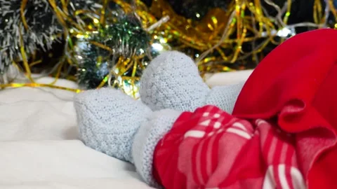 Sleeping, two week old, newborn, baby boy wearing a crocheted Santa hat wit.. Stock Footage 293730997