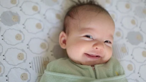 Sleepy Baby with Big Smile Stock Footage 91143653