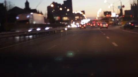 Sleepy driver because of being drunk, tired. Lanterns along road.Defocused image Stock Footage