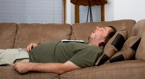 Sleepy fat guy Stock Photos