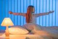 The sleepy girl gesture in the bed. Evening night time Photo