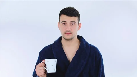 Sleepy man drinking coffe Stock Footage 105926186