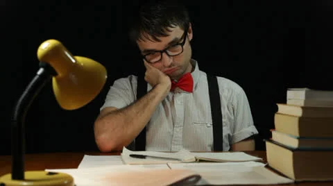 Sleepy nerd man working overtime at night 库存影片 22642703