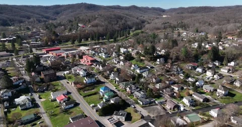 A sleepy small town in late fall after the leaves have fallen Stock Footage 236259666