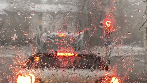 Sleet falling on car windshield Stock Footage 104796019