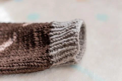 Sleeve of a handmade sweater Stock Photos