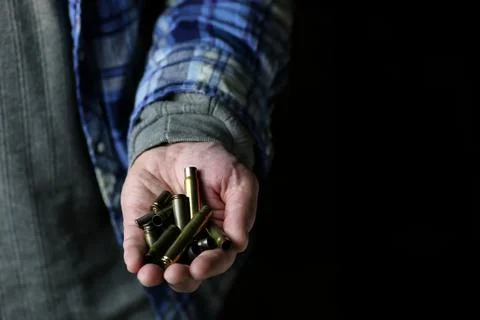 Sleeves weapon in a hands Stock Photos