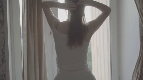 Slender girl with a beautiful Видео 78062389