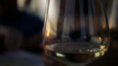 A slender glass of wine with a reflection of the law on it. HD, 1920x1080. slow Stock Footage 80145522