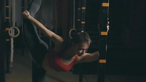 Slender woman does stretching Stock Footage 153095255