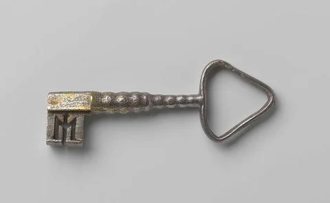 Sleutel.Key with triangular eye, corrugated shaft, which widens downwards ... Stock Photos