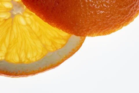 Slice and end of an orange Stock Photos
