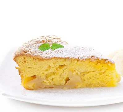 Slice of apple fruit pie on a plate decorated with mint leaf Stock Photos