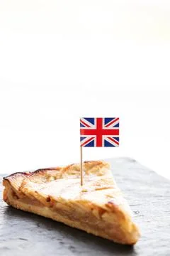 Slice of apple pie and british flag, tart dessert and sweet food Stock Photos