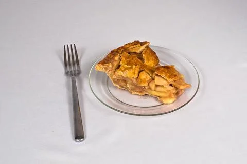 Slice of Apple Pie with Fork Stock Photos