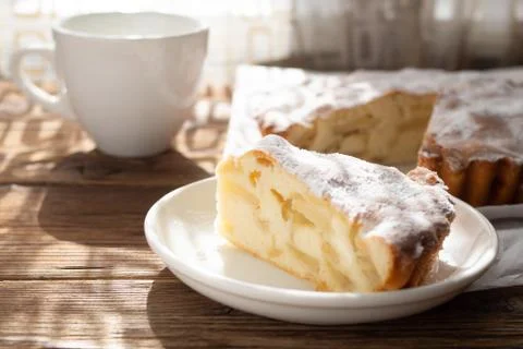 Slice of apple pie on a white plate Stock Photos