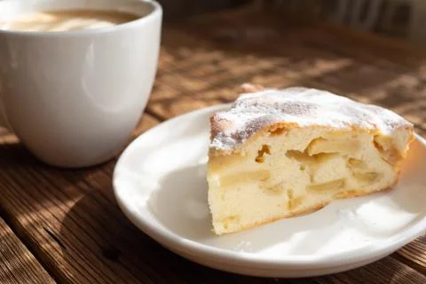 Slice of apple pie on a white plate Stock Photos