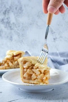 Slice of apple pie in white plate Stock Photos