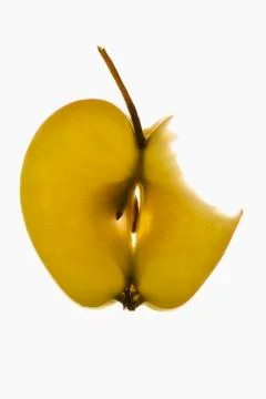 Slice of apple with stalk, a bite taken Foto stock