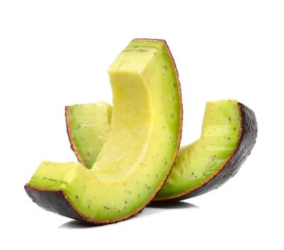 Slice of avocado isolated on white background Stock Photos