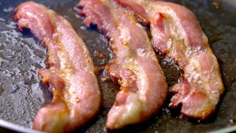 Slice of Bacon on a Frying Pan, a Closeup Shot. 스톡 동영상 334641682