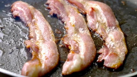 Slice of Bacon on a Frying Pan, a Closeup Shot. 스톡 동영상 334641978