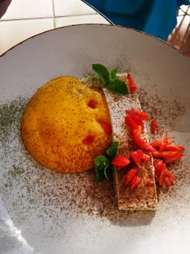 Slice of baked salmon with pumpkin mashed potatoes and freshly chopped Stock Photos