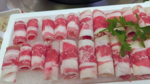 Slice of beef and pork beside mala hotpot Stock Footage 283888831