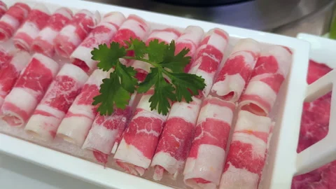 Slice of beef and pork beside mala hotpot Stock Footage 285158812