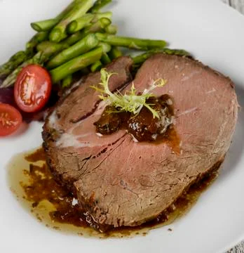 Slice of beef roast Stock Photos