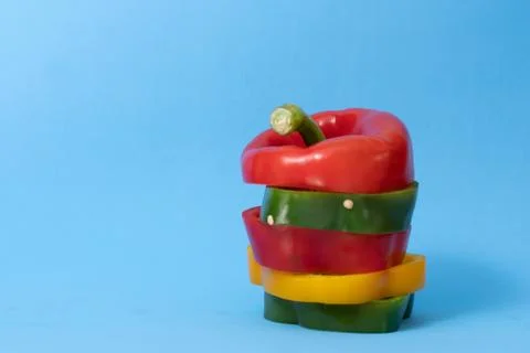 Slice bell pepper on colour background Fotos Stock