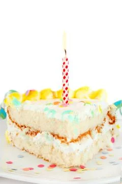 Slice of birthday cake Stock Photos