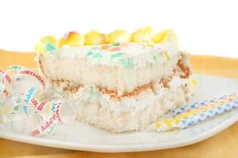 Slice of birthday cake Stock Photos