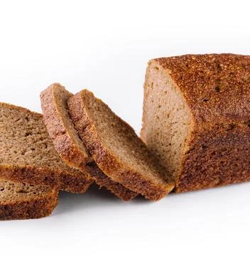 Slice of black bread closeup on white Stock Photos