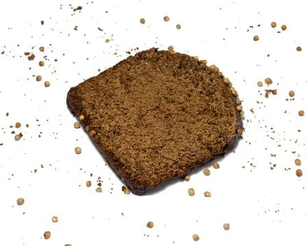 Slice of black bread sprinkled with coriander. Borodino bread. Flour product. Stock Photos