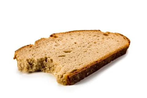 Slice of bread bitten on white background Stock Photos