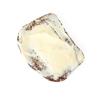 Slice of bread with butter isolated on white, top view Stock Photos