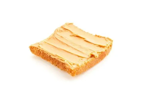 Slice of bread with butter spread on top Stock Photos