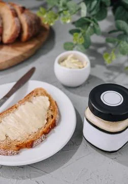 Slice of bread with butter top view Stock Photos