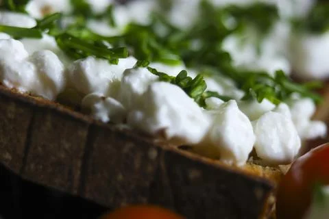 Slice of bread with cottage cheese and chives. Healthy meal Stock Photos