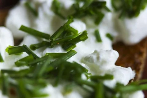Slice of bread with cottage cheese and chives. Healthy meal Stock-Fotos