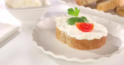 Slice of bread with cream cheese Stock Footage 241221023