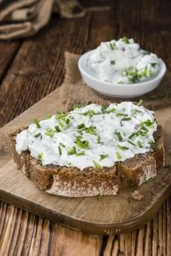 Slice of Bread with Herb Curd (detailed close-up shot) Stock Photos