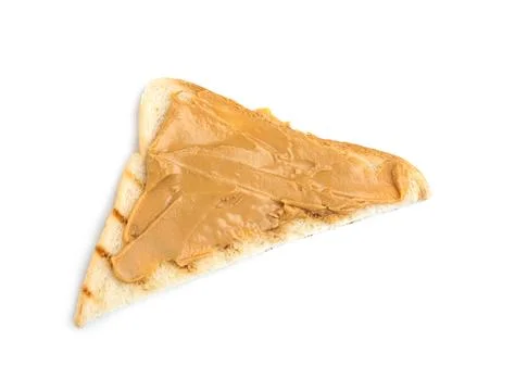 Slice of bread with peanut butter on white background, top view Stock Photos
