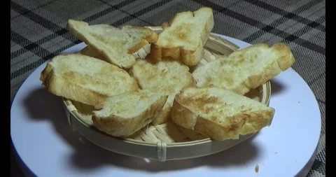 Slice of bread on plate Stock Footage 294156755