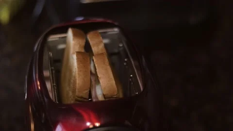 Slice Bread Popping out of Toaster Stock Footage 166598527