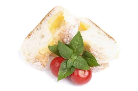 Slice bread with red tomato and basil Stock Photos