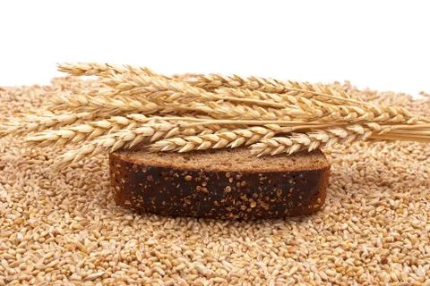 Slice bread with wheat ears Stock Photos