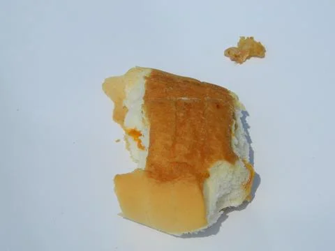 Slice of BREAD ON A WHITE BACKGROUND ISOLATION Stock Photos